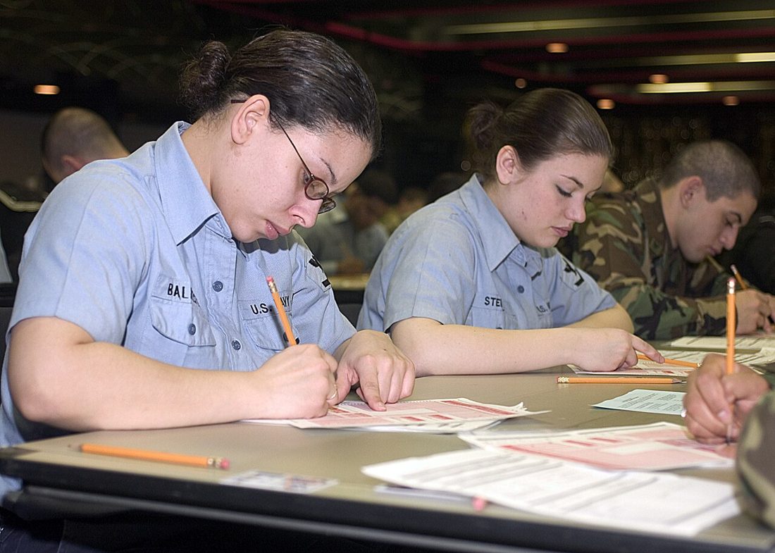 People sitting a written examination